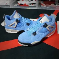 EM Sneakers Jordan 4 Retro University Blue review 0