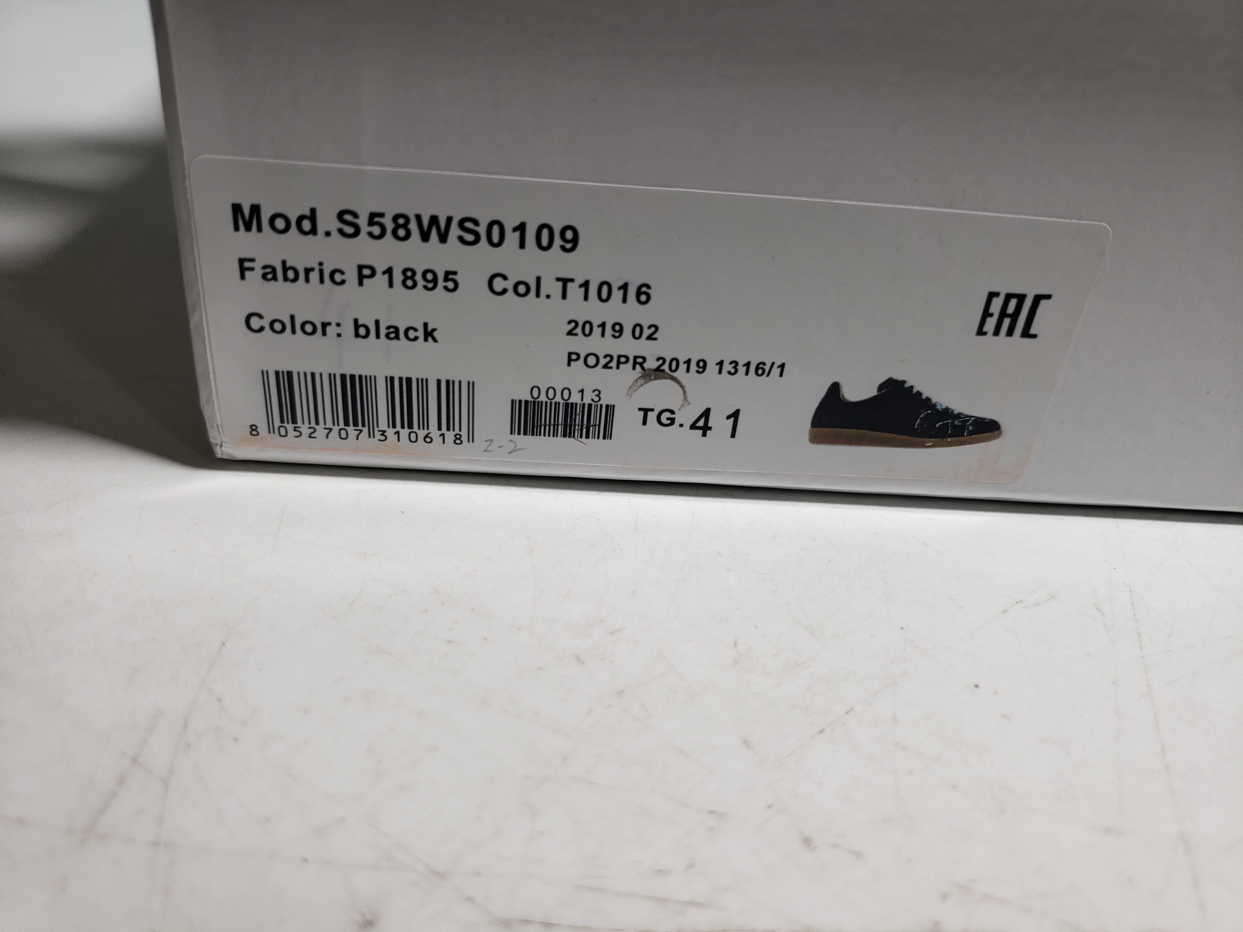 Maison Margiela Black Paint Replica Sneakers S58WS0101P1892963