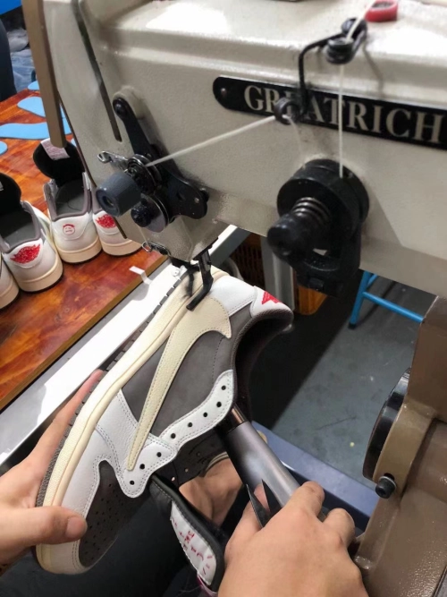 Production images of the Travis Scott x Air Jordan 1 Low OG Reverse Mocha 01 DM7866-162 dopesneakers