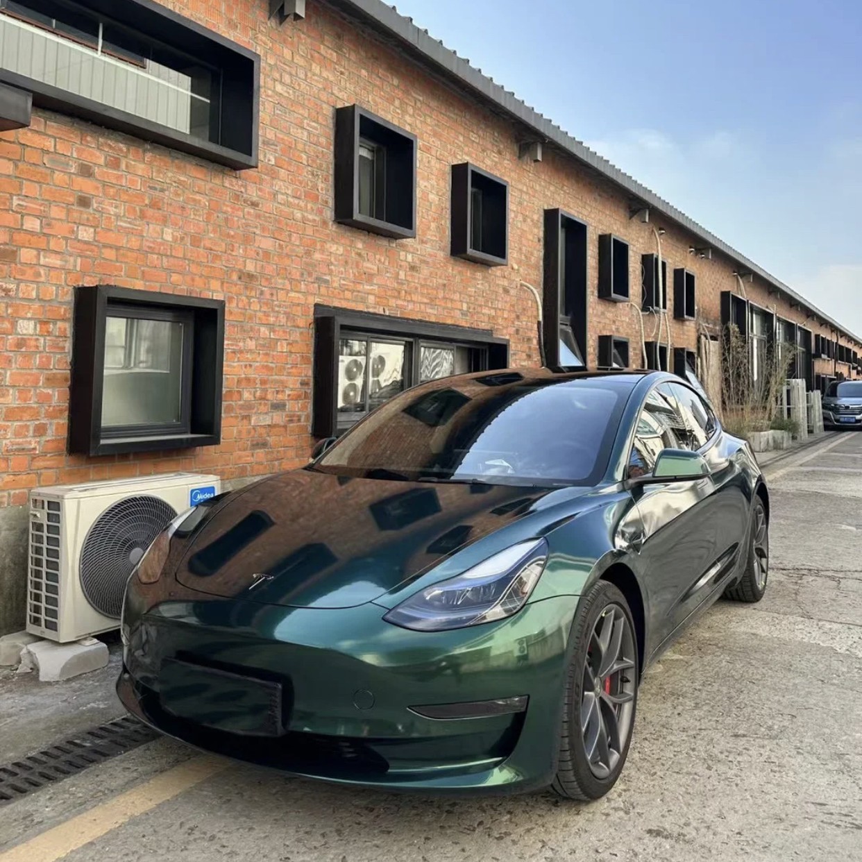 Model 3 sales green wrap