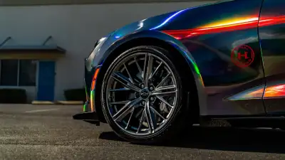 Ravoony Plus Gloss Holographic Rainbow Chrome Laser Black Car Vinyl Wrap review Wraptors Orlando 02