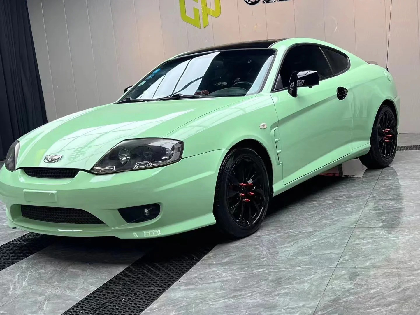 Ravoony Plus PET Ferrari Gloss Moss Green Vinyl Car Wrap review Luminous Wraps Co 00