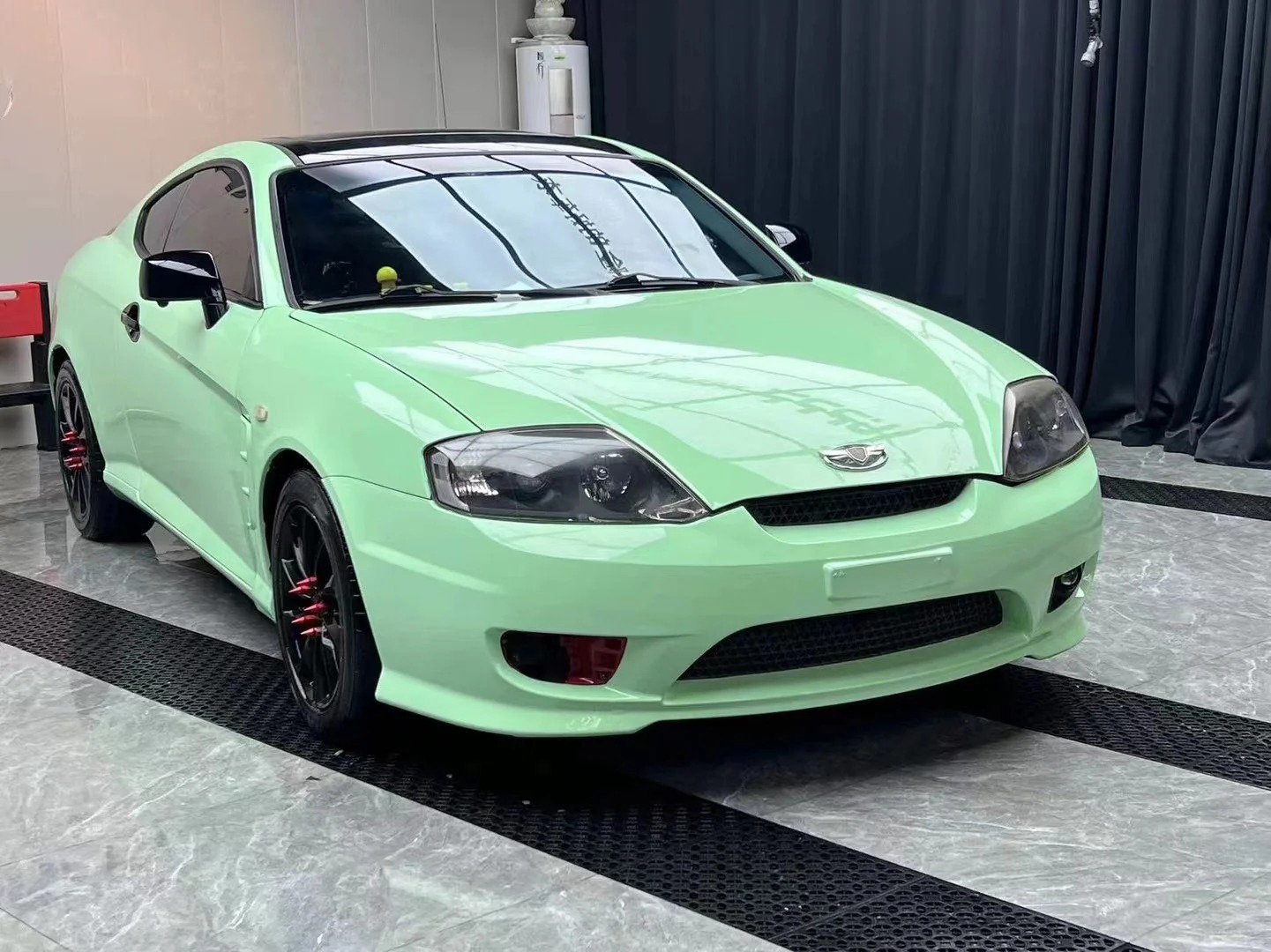 Ravoony Plus PET Ferrari Gloss Moss Green Vinyl Car Wrap review Luminous Wraps Co 01