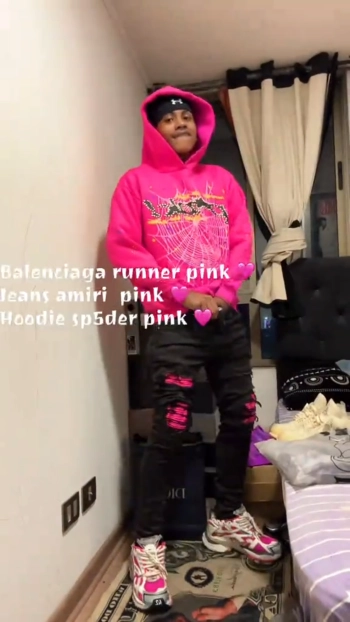 Pink Sp5der P*nk hoodie with Amiri distressed jeans and pink Balenciaga Runner sneakers outfit.