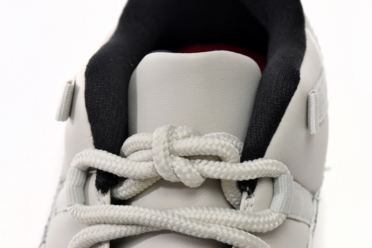     Air Jordan 11 Retro Low Snake Light Bone