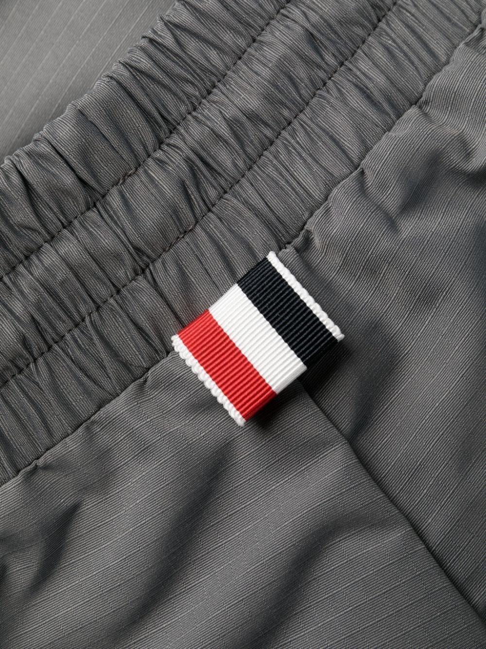     Thom Browne 4-Bar Stripe track pants MJQ129A07863  