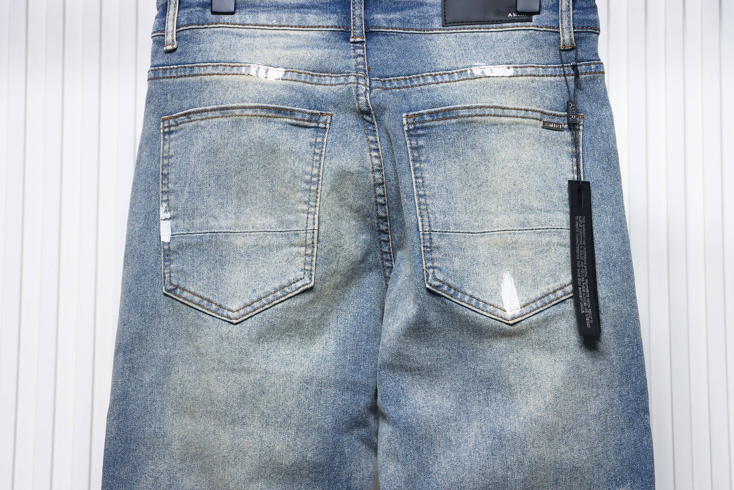 Top Quality AMIRI Inked and rhinestone jeans