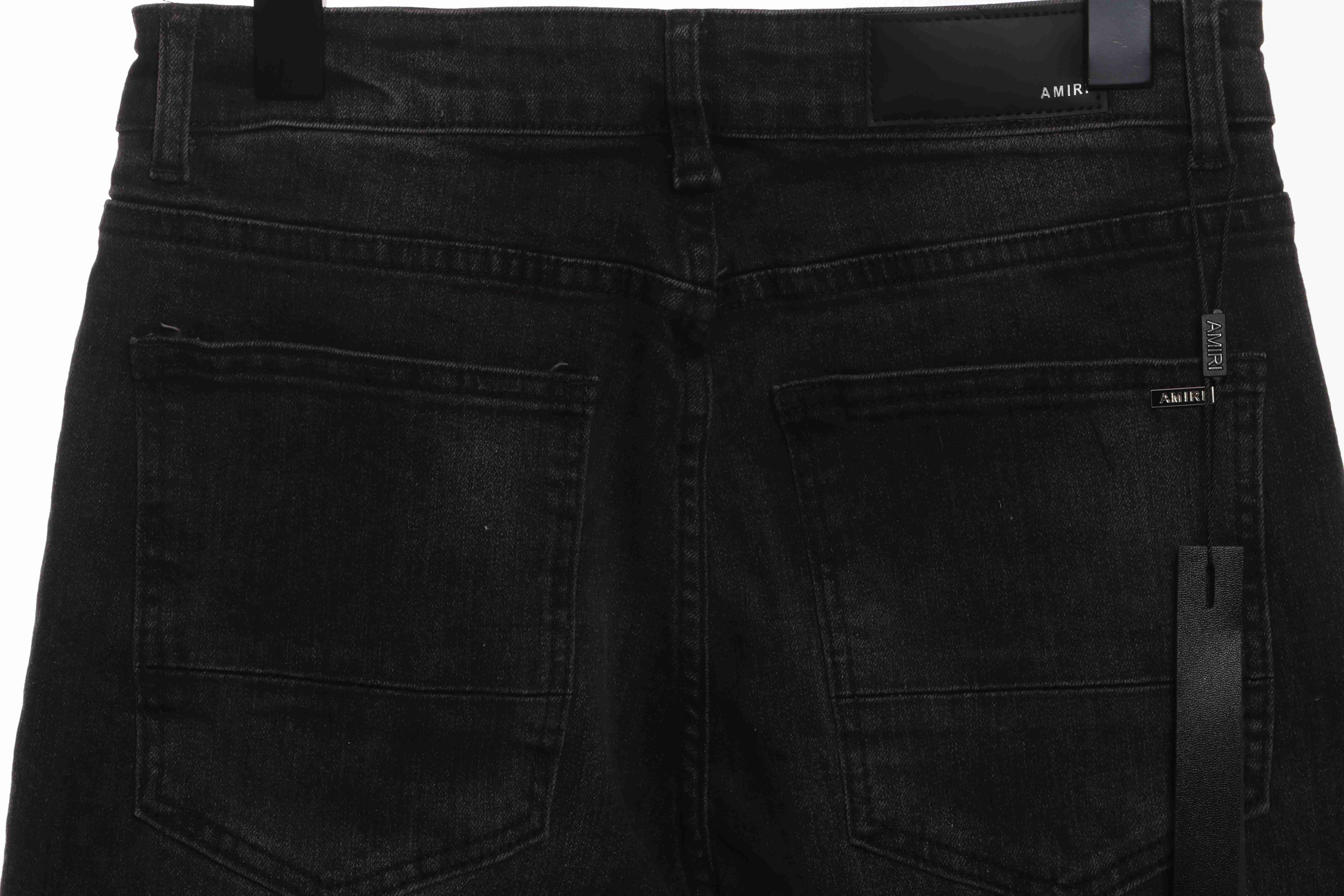     AMIRI Ripped Denim Pants