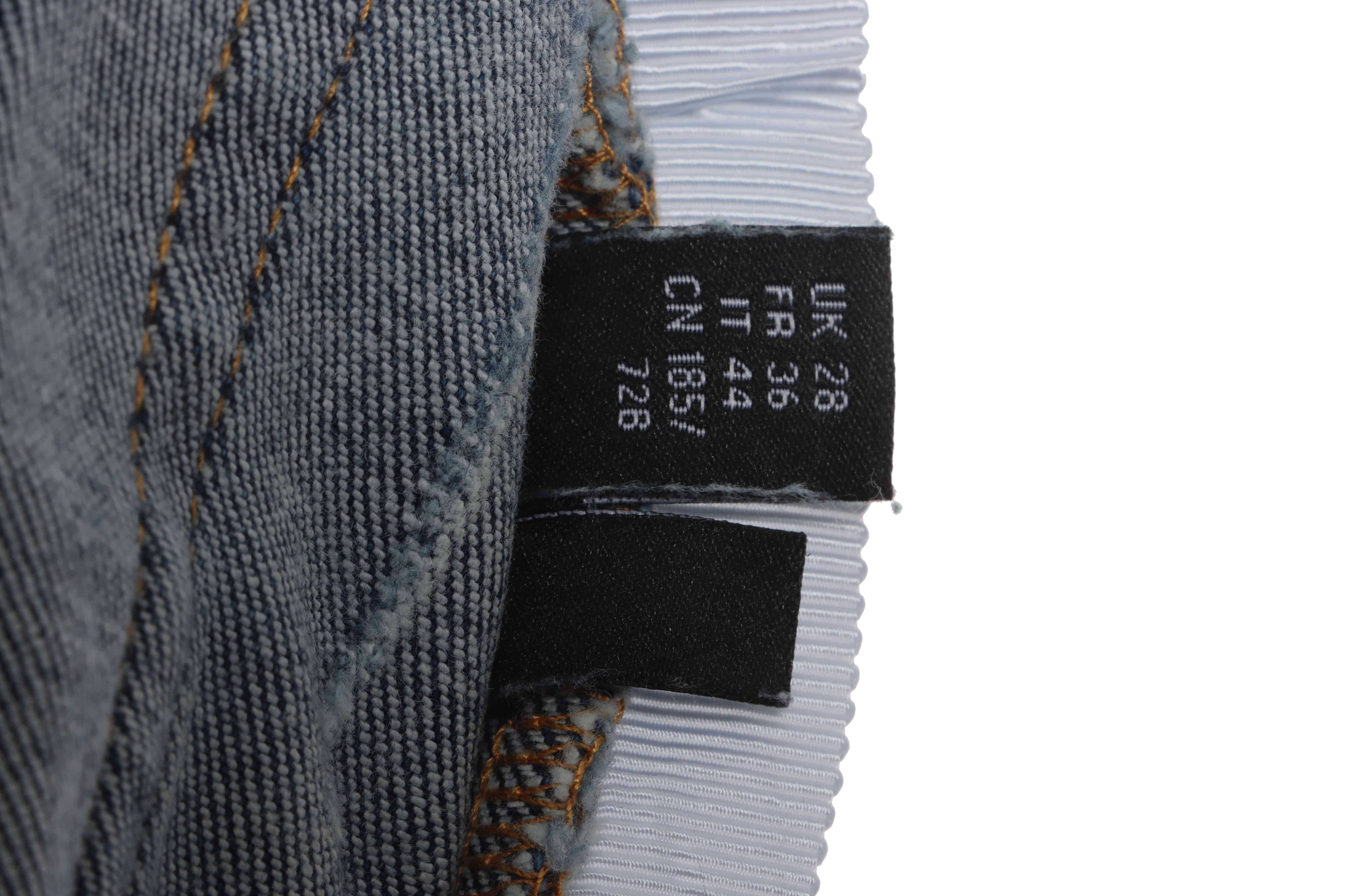    AMIRI Washed blue ripped jeans