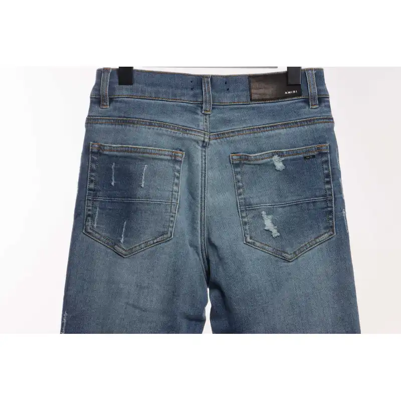 Top Quality AMIRI Washed blue ripped jeans