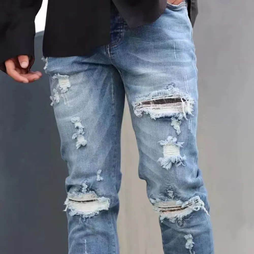 Top Quality AMIRI Washed blue ripped jeans