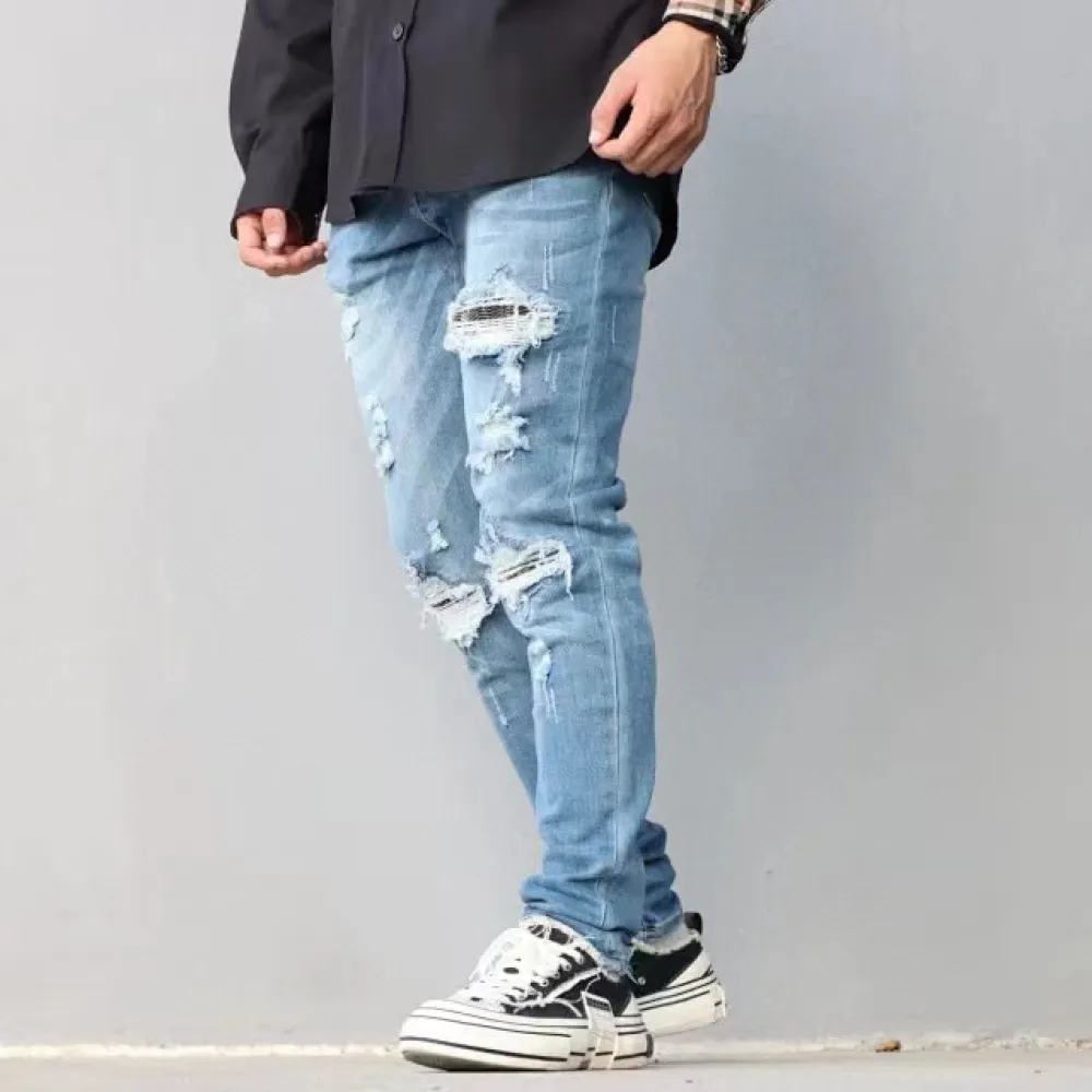 Top Quality AMIRI Washed blue ripped jeans