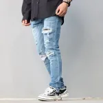 Top Quality AMIRI Washed blue ripped jeans