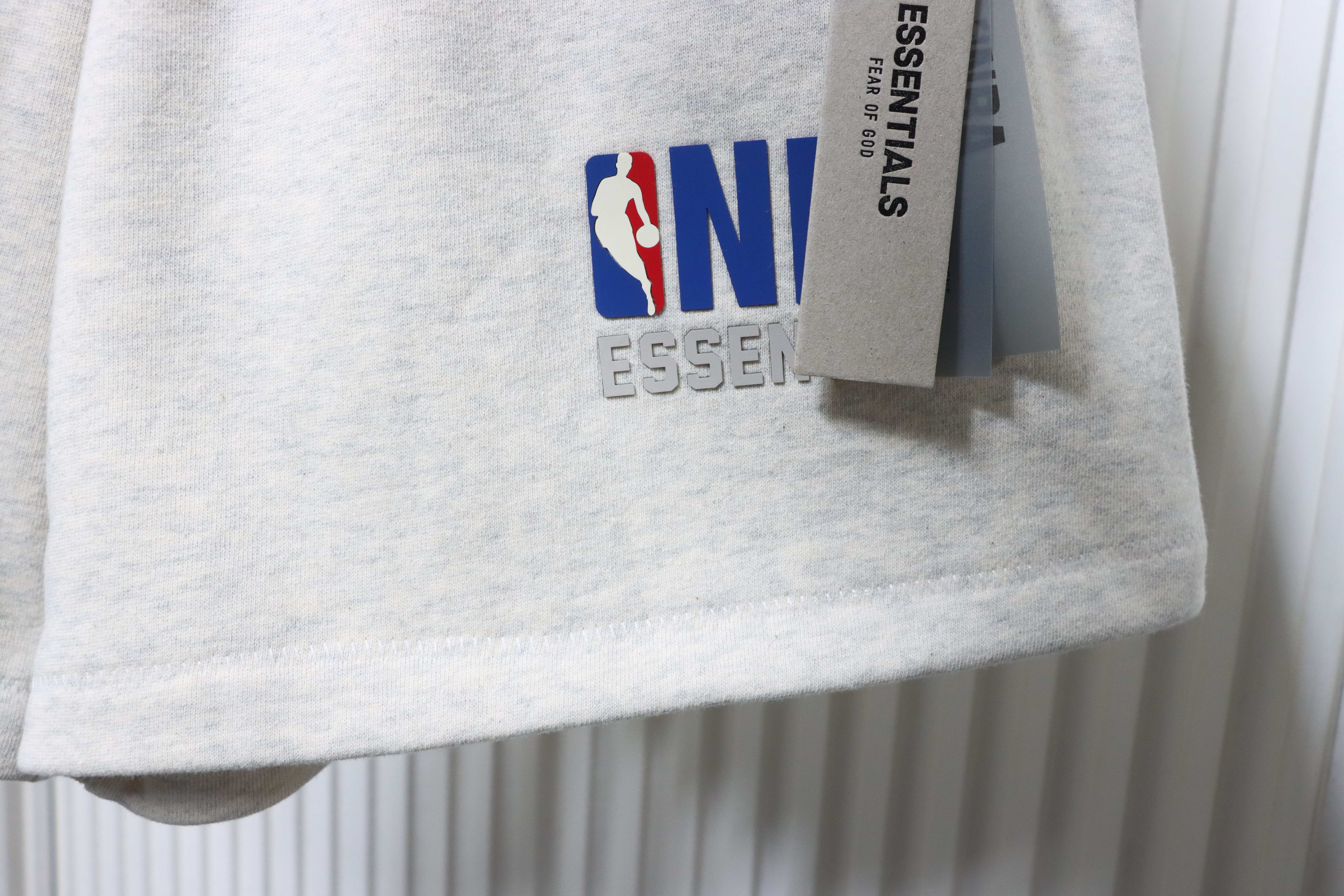     Fear of God Essentials NBA 90's Short Vintage White