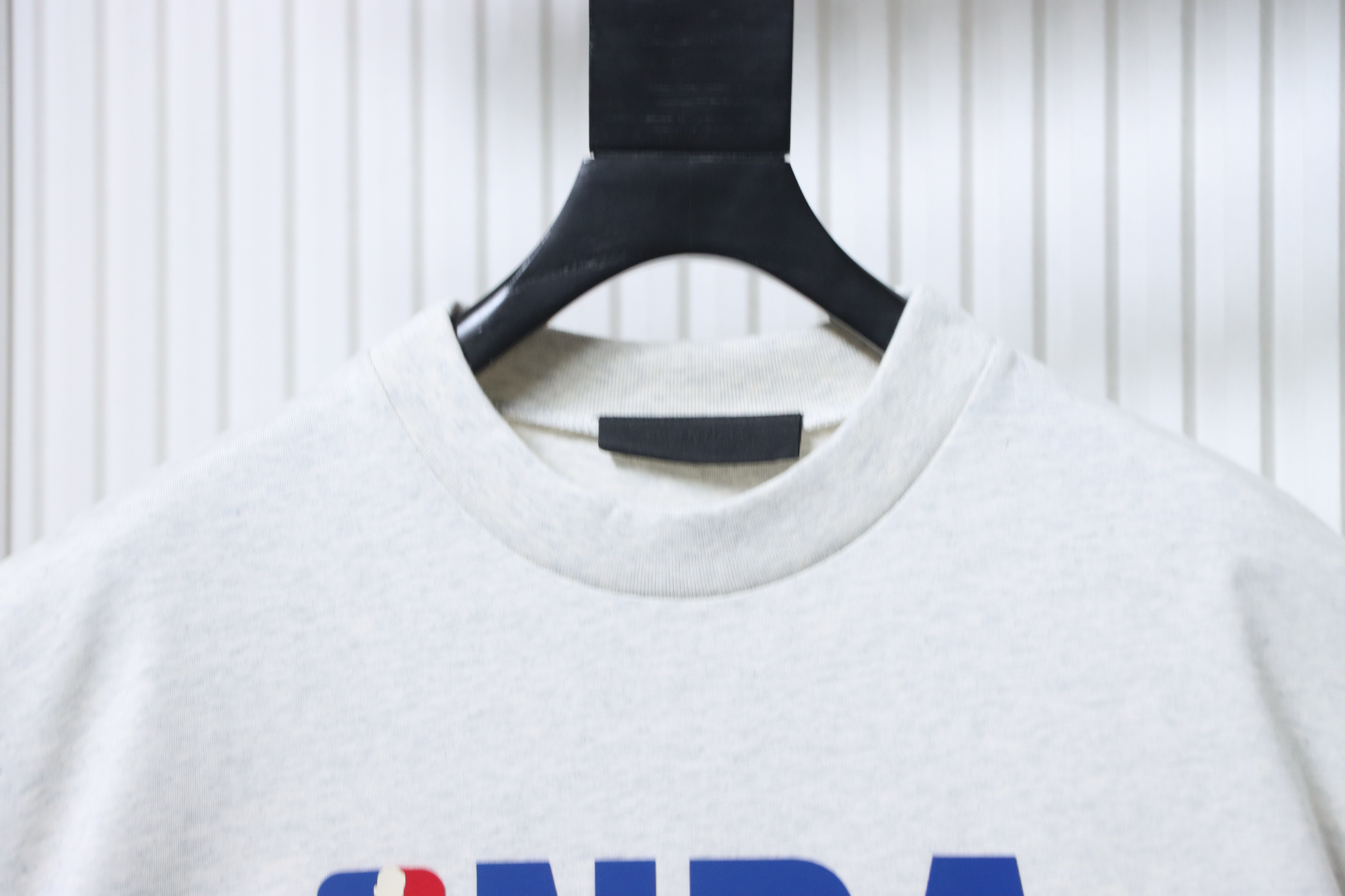     Fear of God Essentials NBA 90's Tee Vintage White