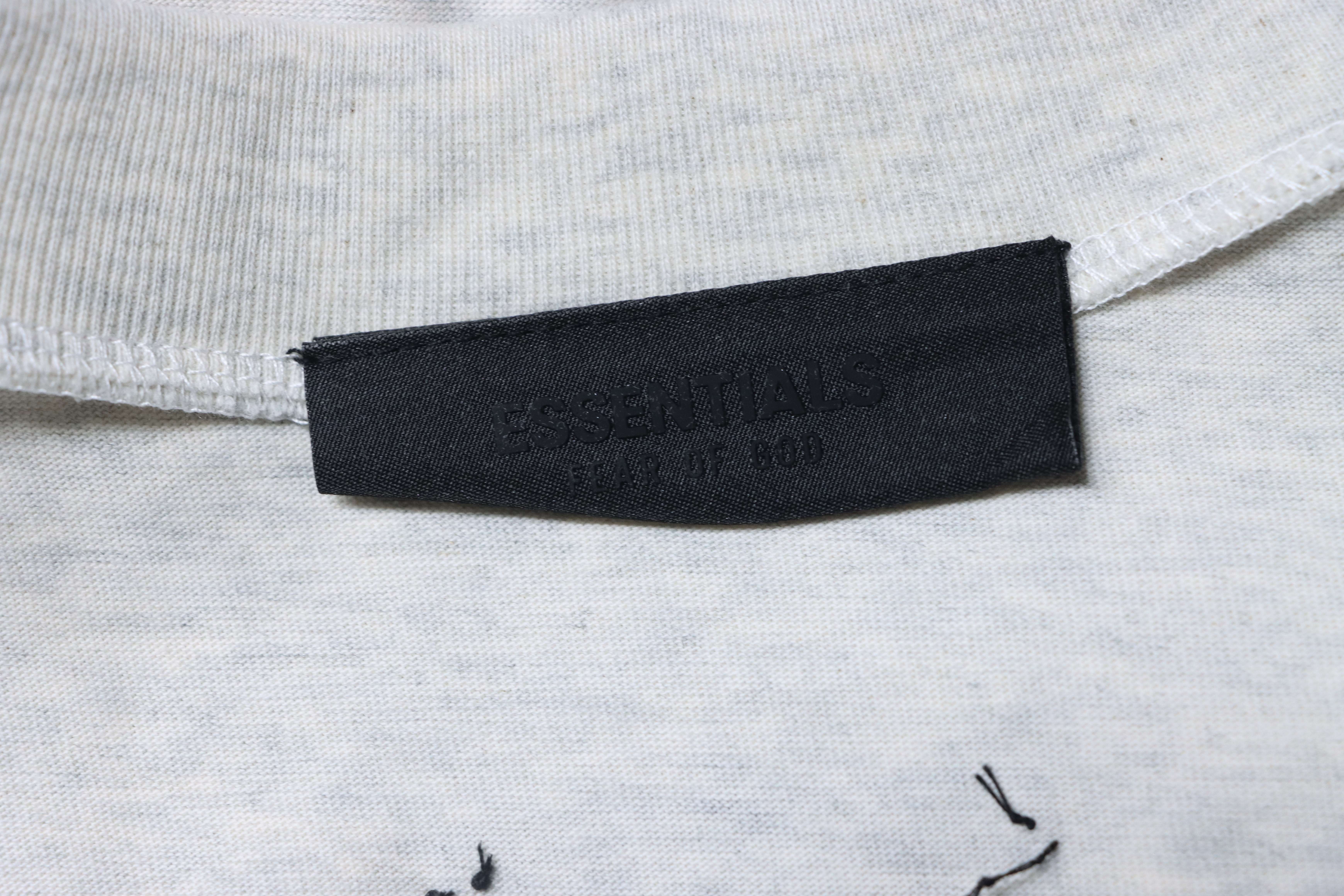     Fear of God Essentials NBA 90's Tee Vintage White