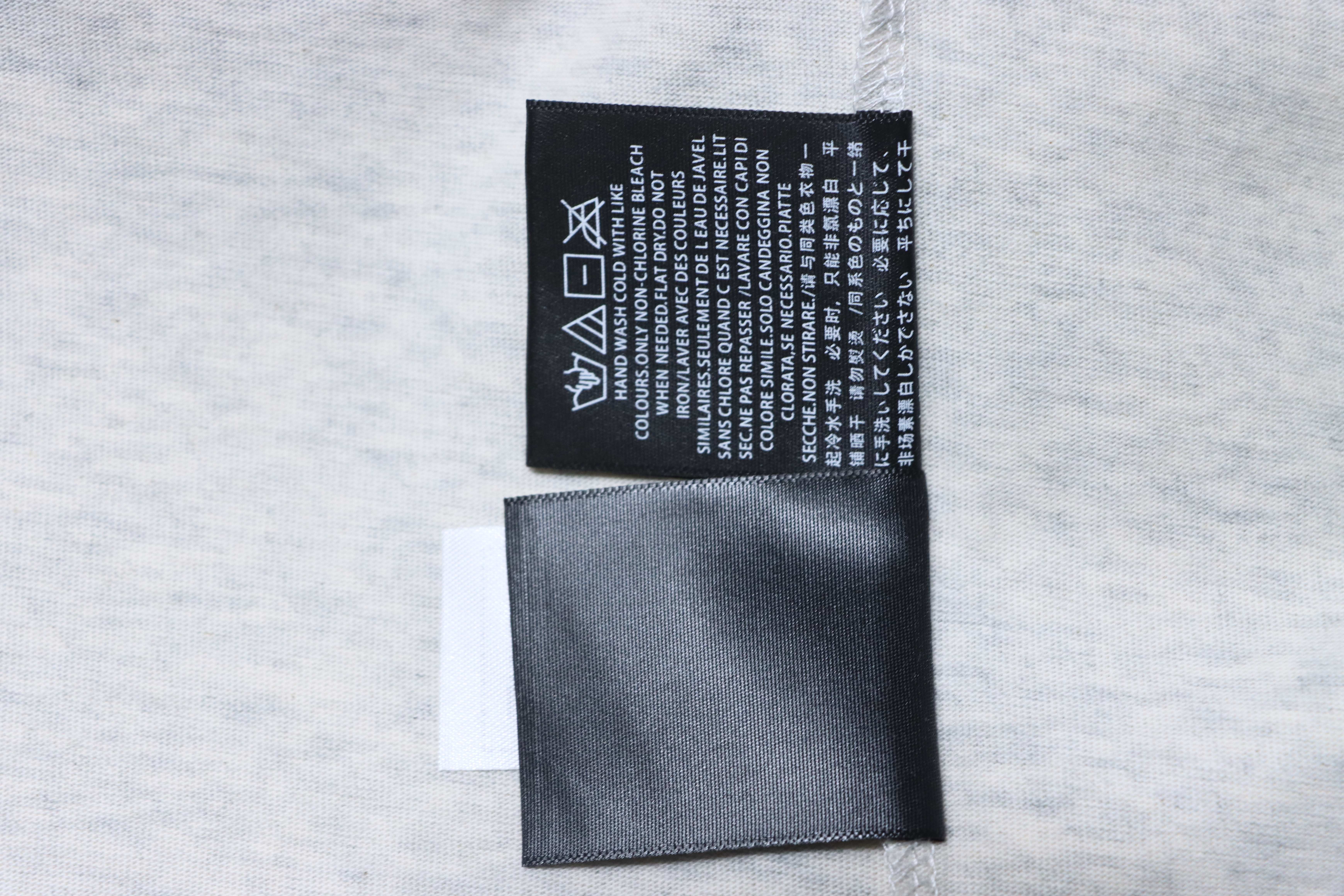     Fear of God Essentials NBA 90's Tee Vintage White