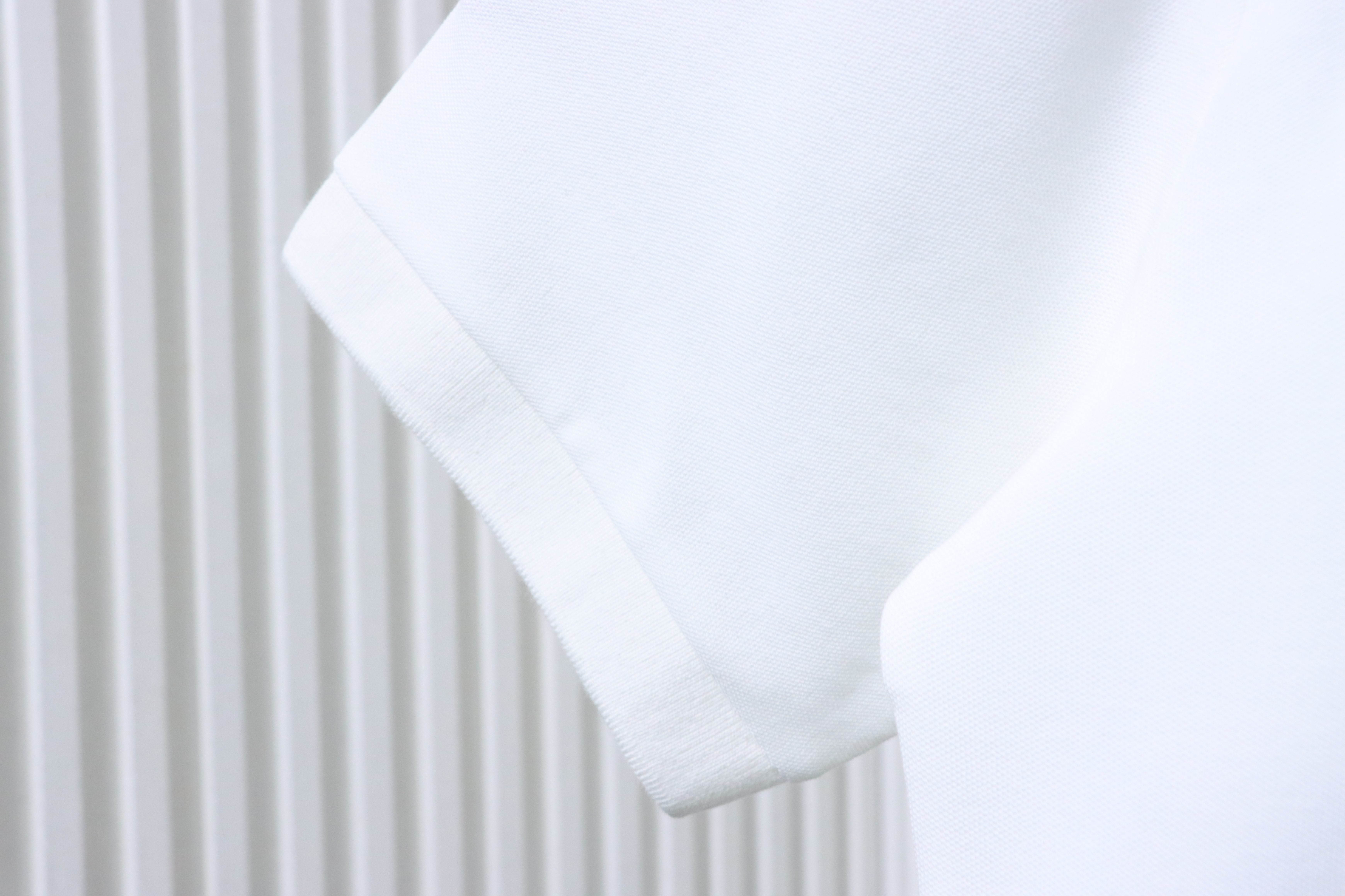 Top Quality    Cotton polo shirt with Gucci embroidered pocket