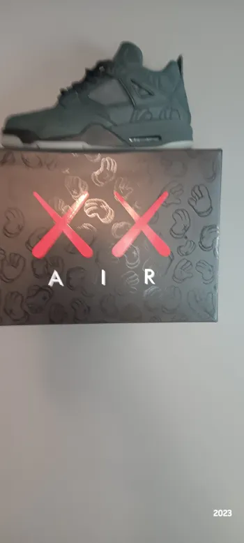 Pkgod Air Jordan 4 Retro Kaws Black review Bcockerham8508 02