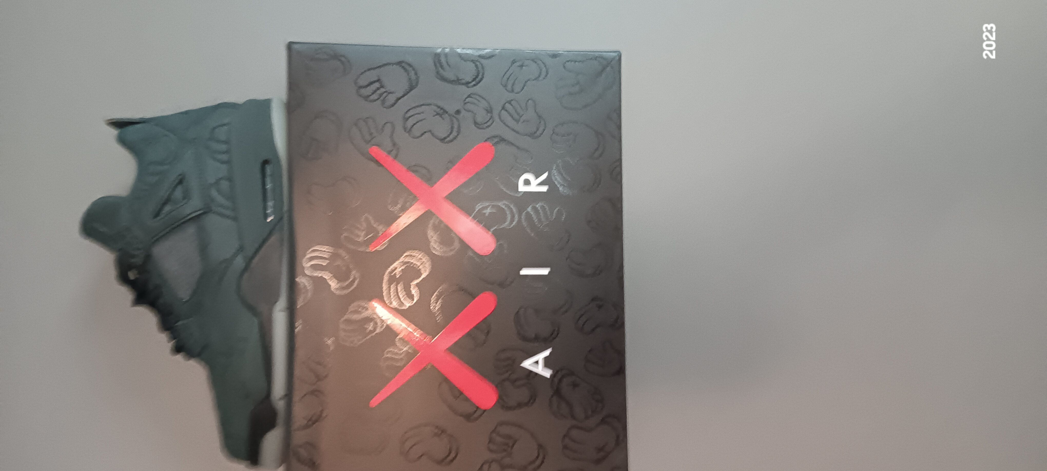 Pkgod Air Jordan 4 Retro Kaws Black review Bcockerham8508@gmail.com