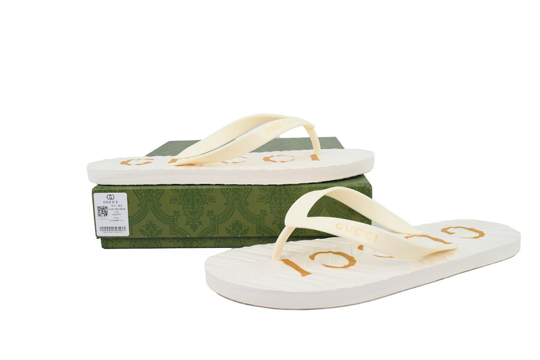 Gucci Branded White Rubber Flip Flops with Gold Accent Logo
