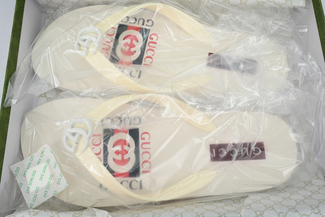 Gucci Ivory Rubber Flip Flops with Printed Logo and White GG Hardware