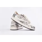 Travis Scott x Air Jordan 1 Low Snake Print