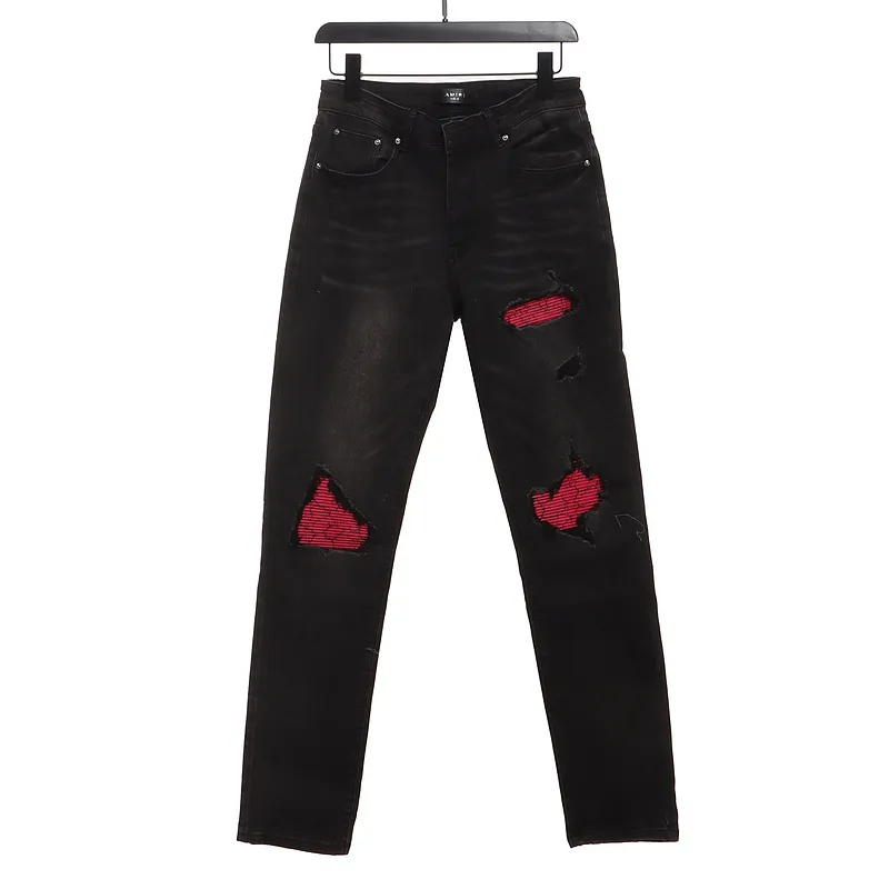 AMIRI pink ripped jeans 200