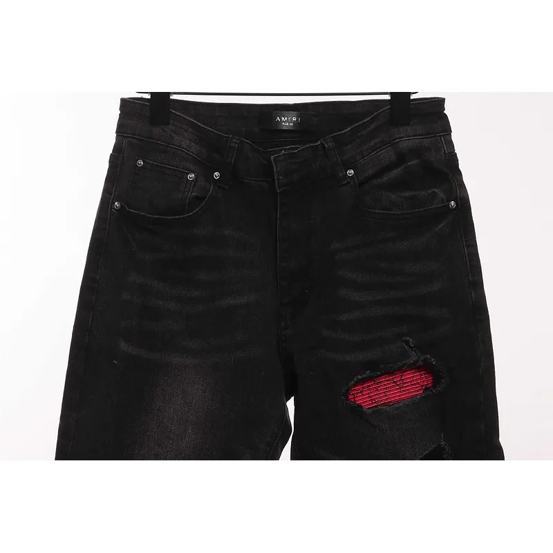 AMIRI pink ripped jeans 200