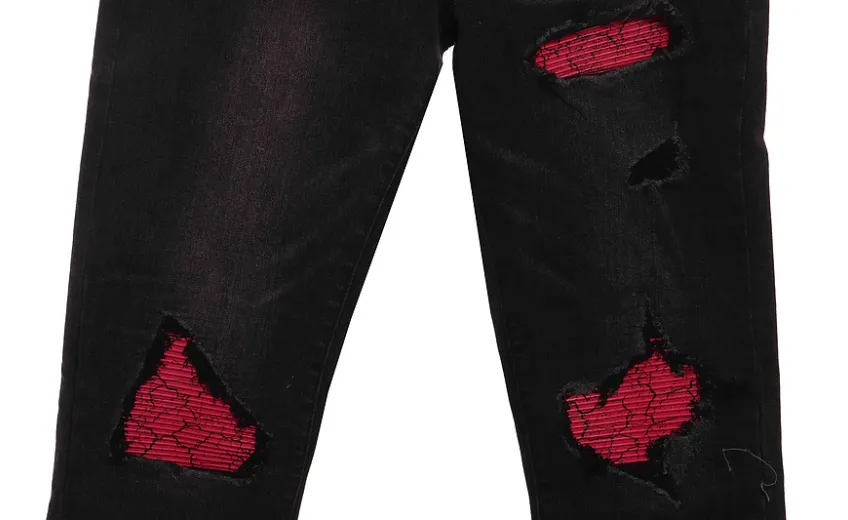 AMIRI pink ripped jeans 200