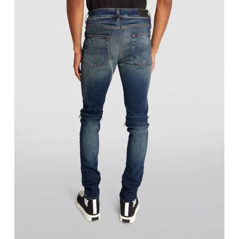 OBO AMIRI Stonewashed Distressed Slim Cut Jeans Deep Classic Blue