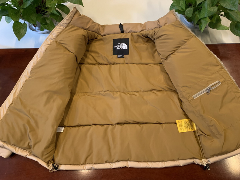 the n0*h F**e kha ki down jacket