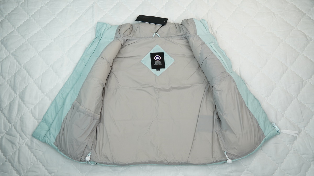 Can*a Go*e outdoor sports down vest glacier water blue