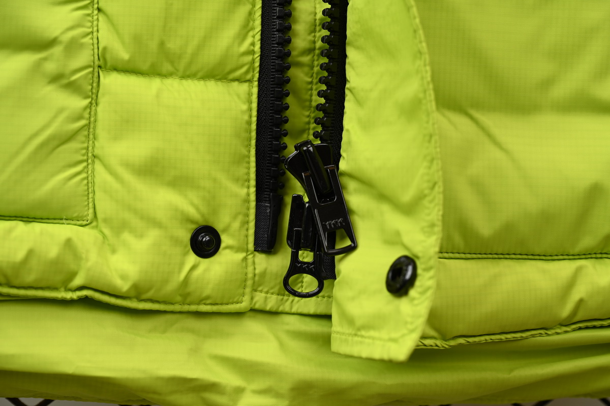 Can*a Go*e outdoor sports down vest navy fluorescent green