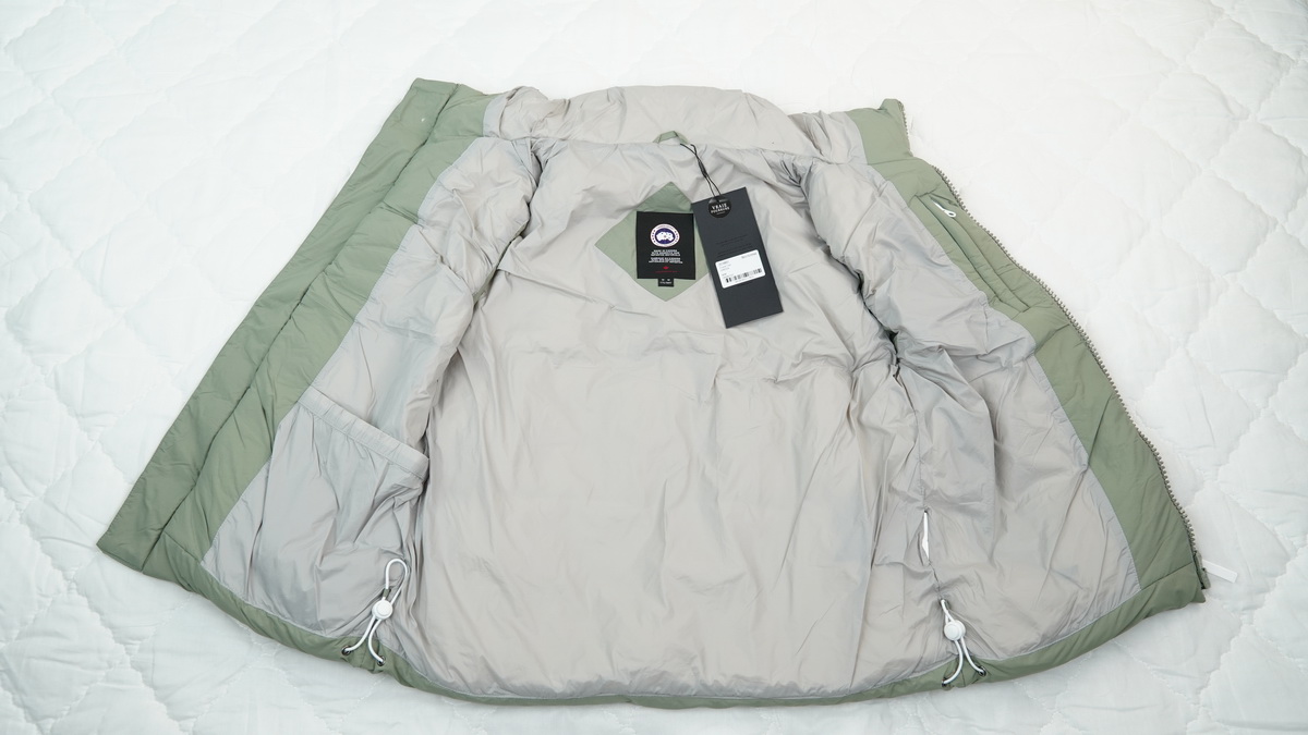 Can*a Go*e outdoor sports down vest olive green
