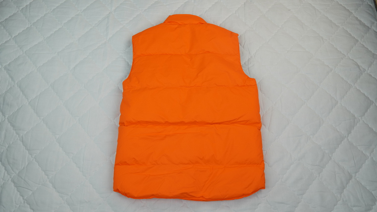 Can*a Go*e outdoor sports down vest orange