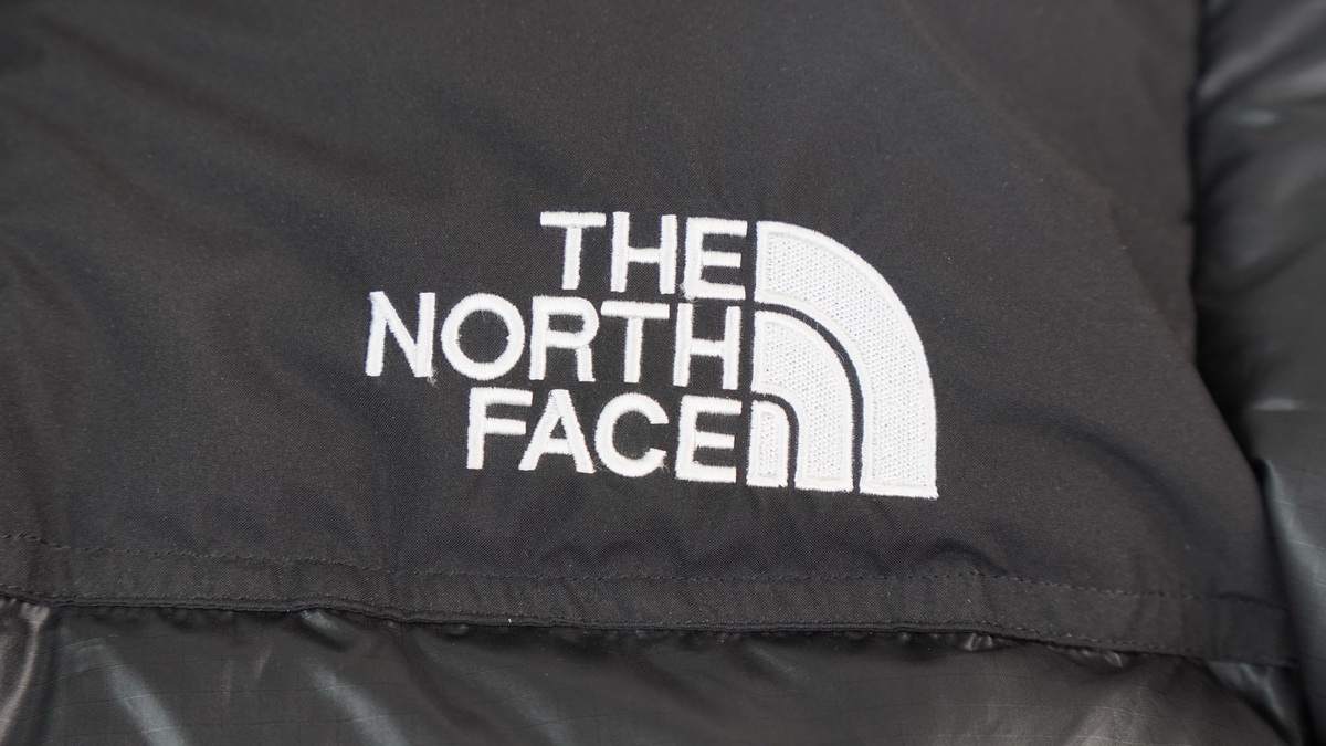 the n0*h F**e splicing white and black down jacket
