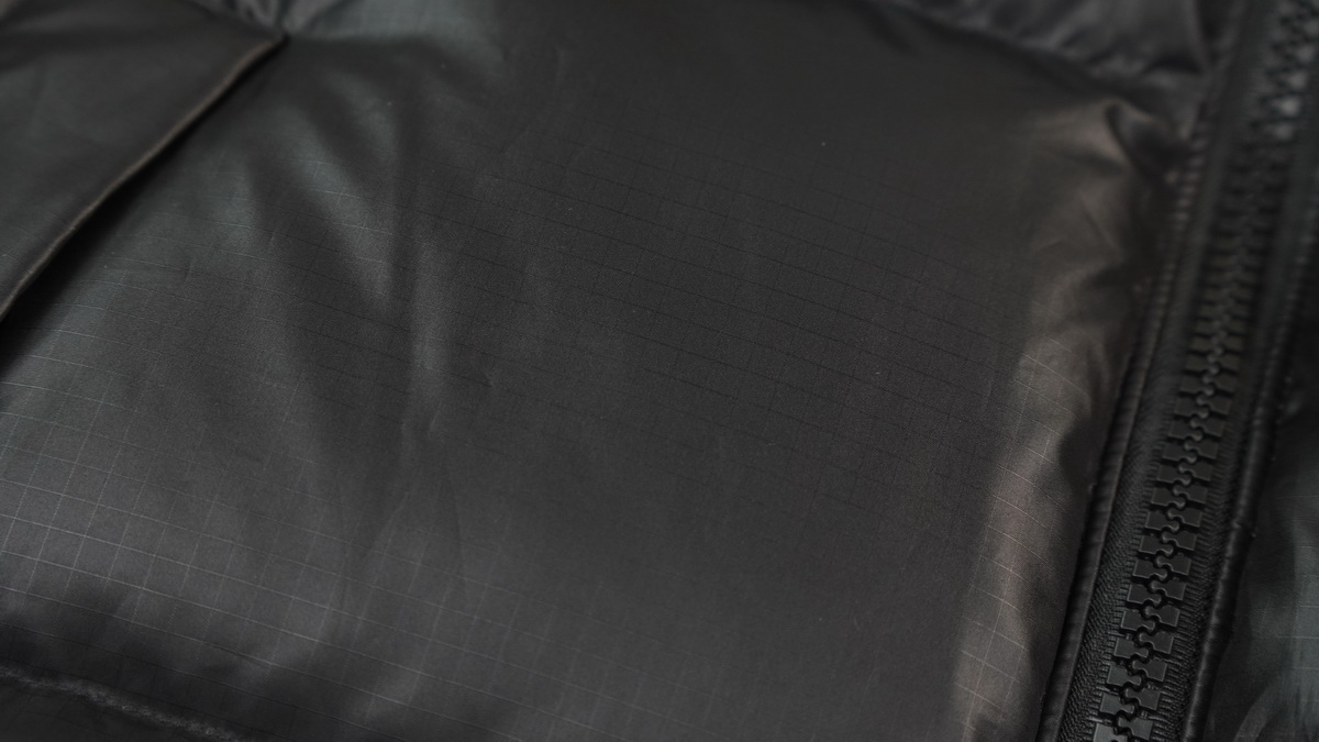 the n0*h F**e splicing white and black down jacket