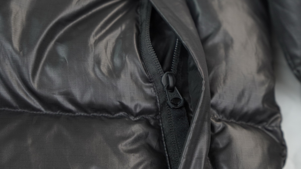 the n0*h F**e splicing white and black down jacket