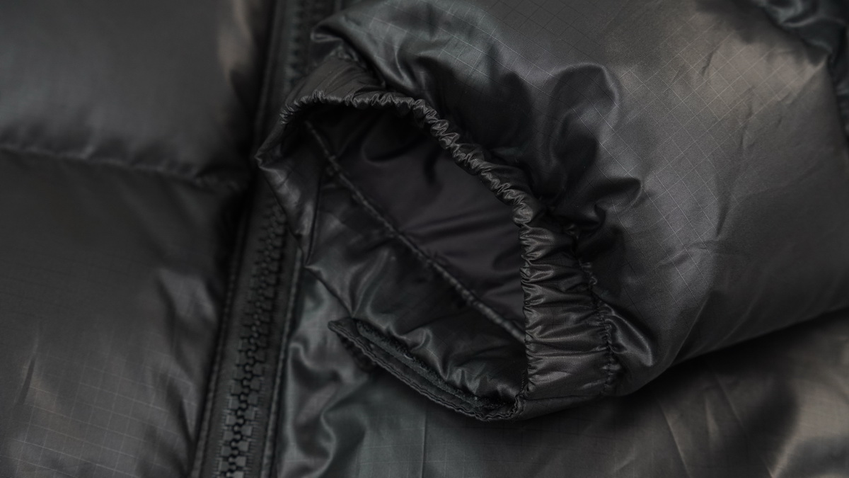 the n0*h F**e splicing white and black down jacket