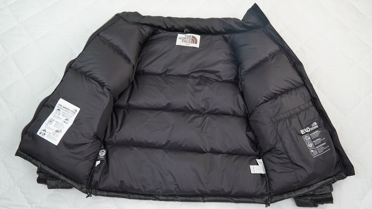 the n0*h F**e splicing white and black down jacket