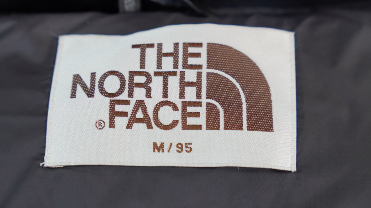 the n0*h F**e splicing white and black down jacket