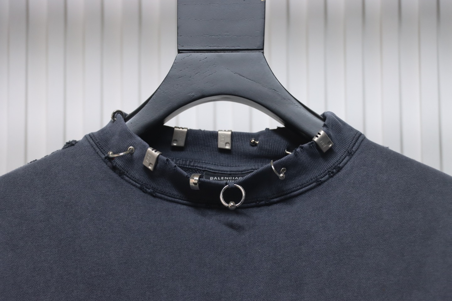Ba*len*cia*ga 23fw round neck sweatshirt with ring buttons and rivets