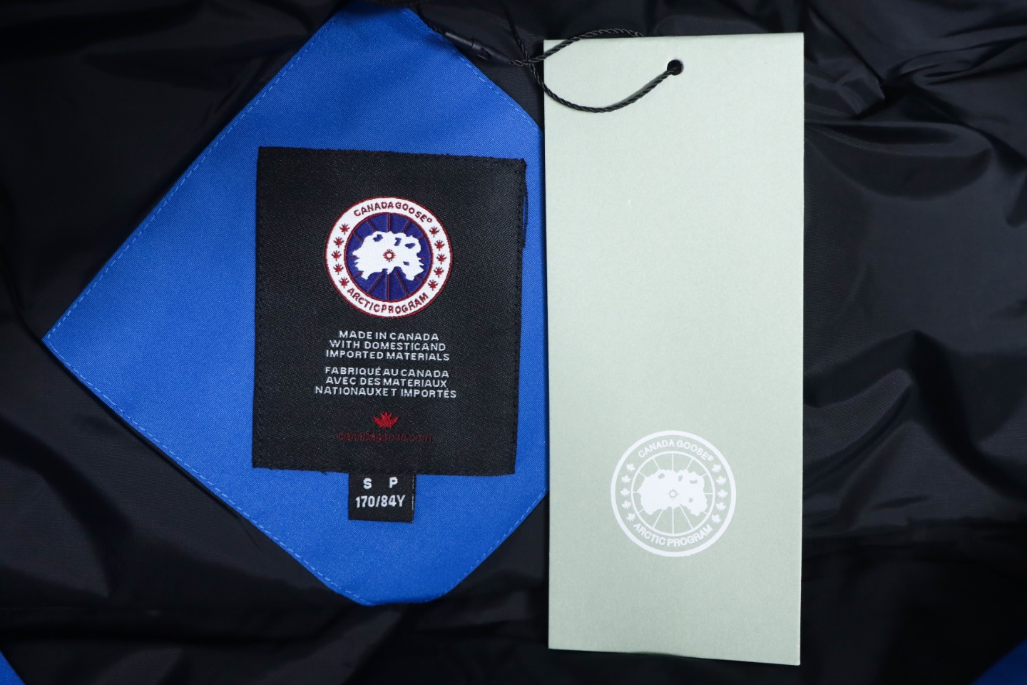 Can*a Go*e short down jacket 01 blue