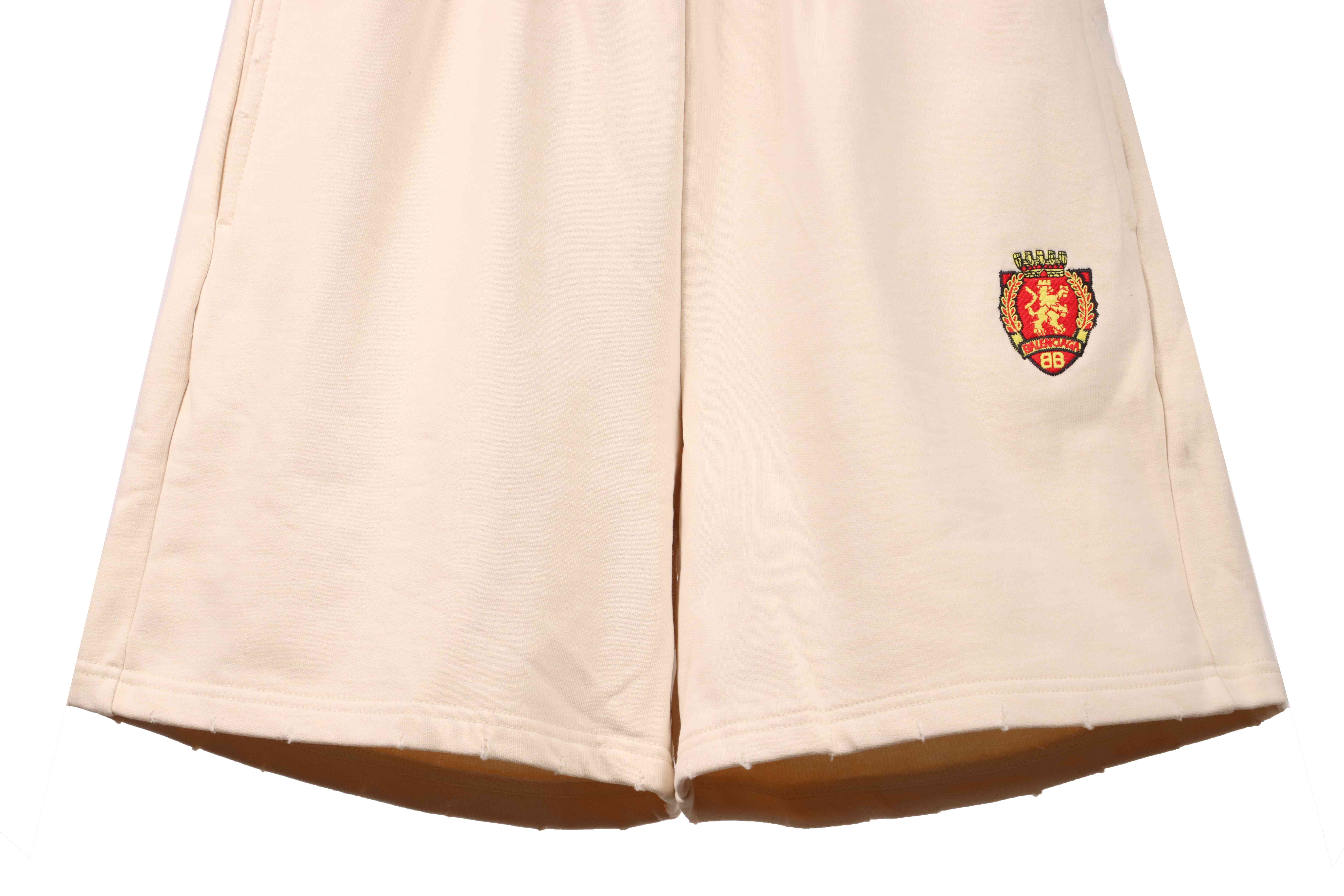 Balenciaga Distressed Logo Shorts