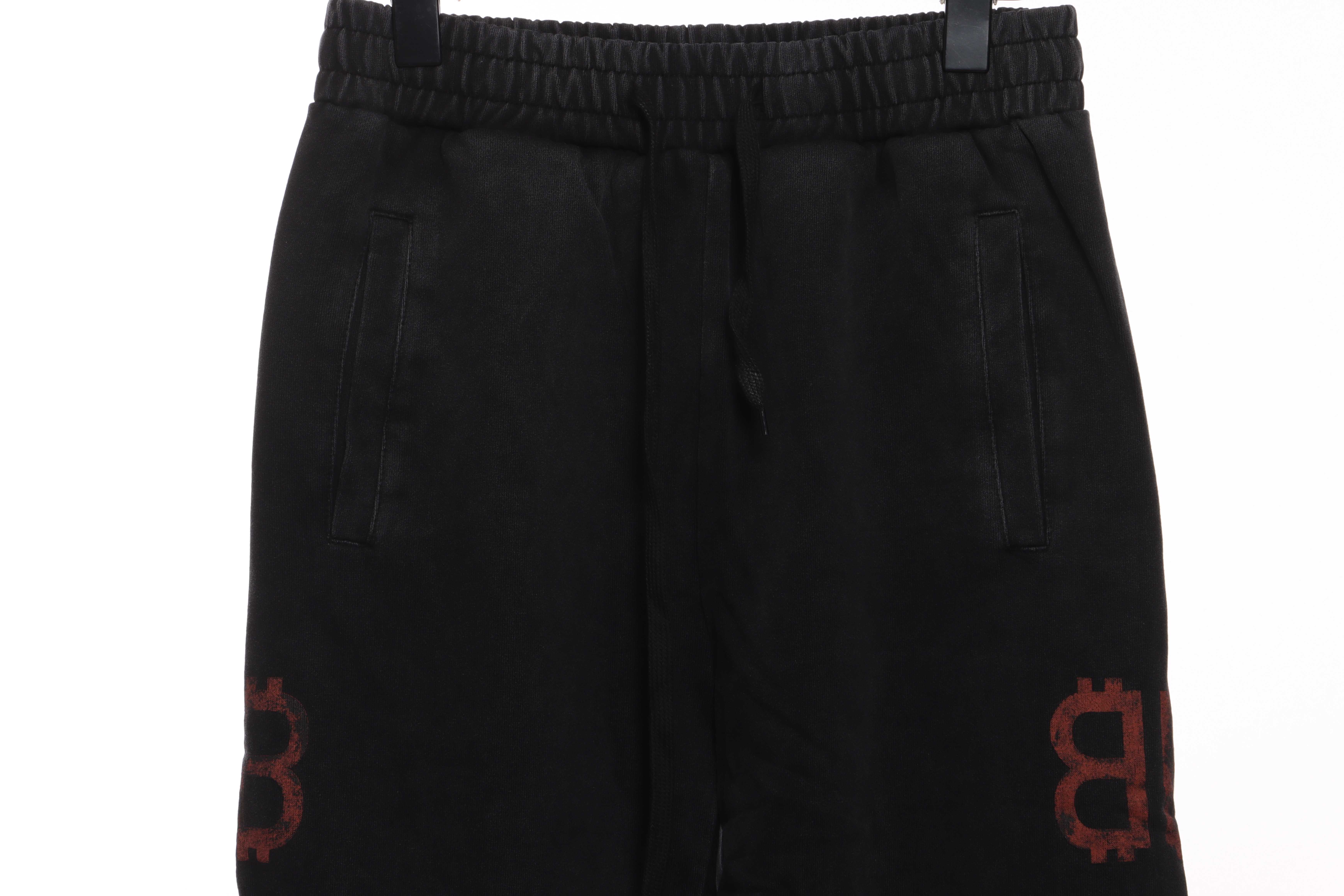 Balenciaga Double B Distressed Mud-Dyed Trousers