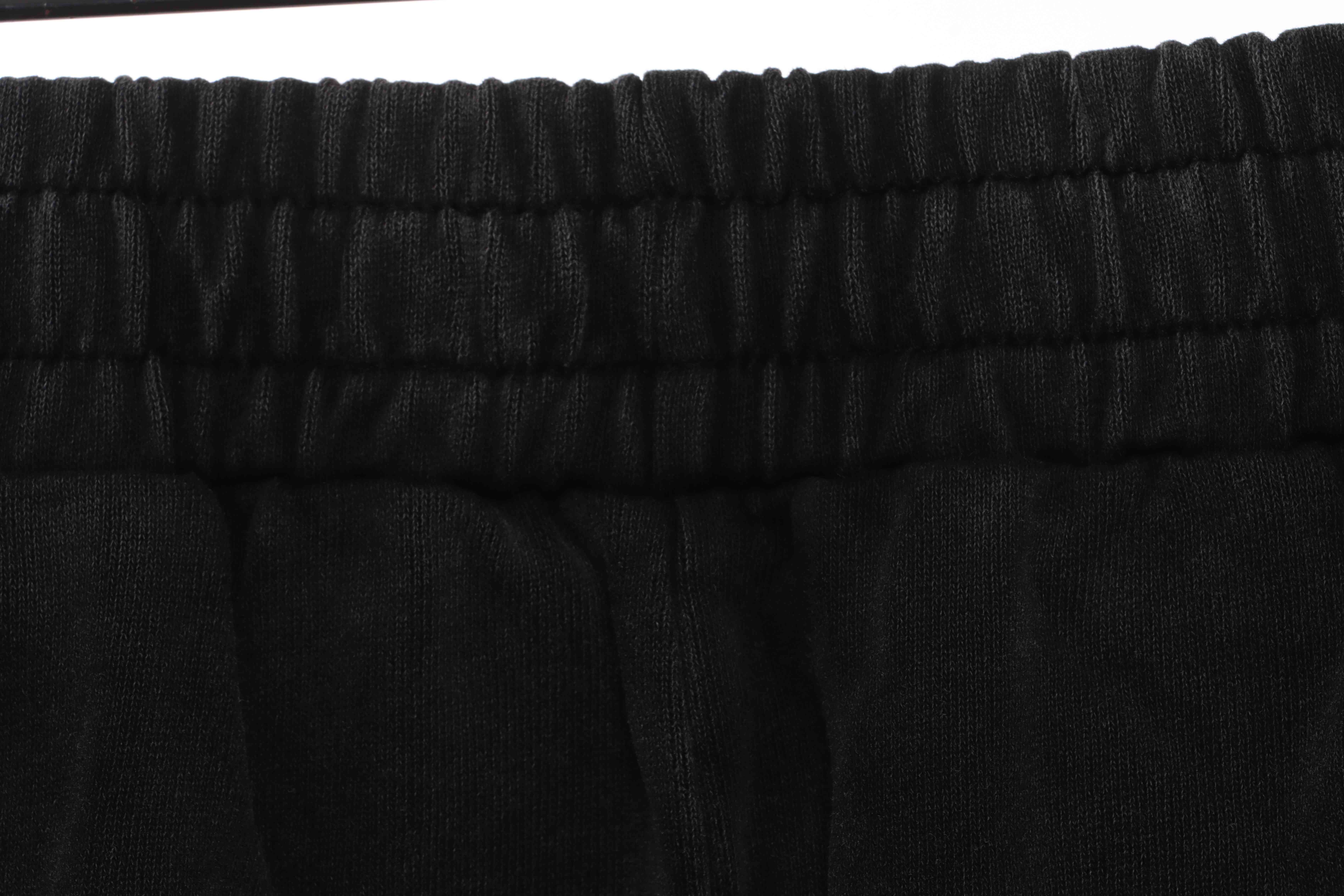 Balenciaga Double B Distressed Mud-Dyed Trousers