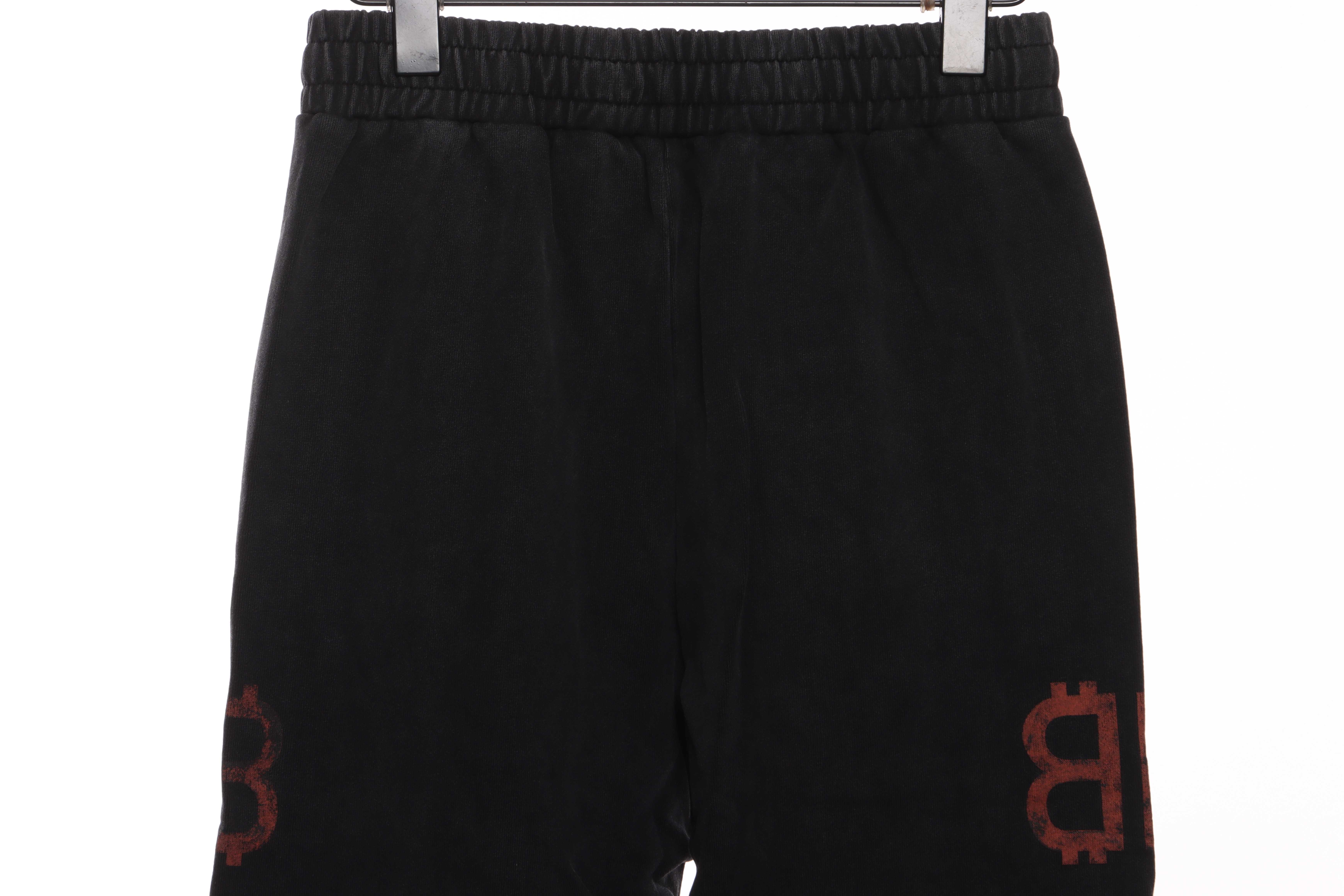 Balenciaga Double B Distressed Mud-Dyed Trousers