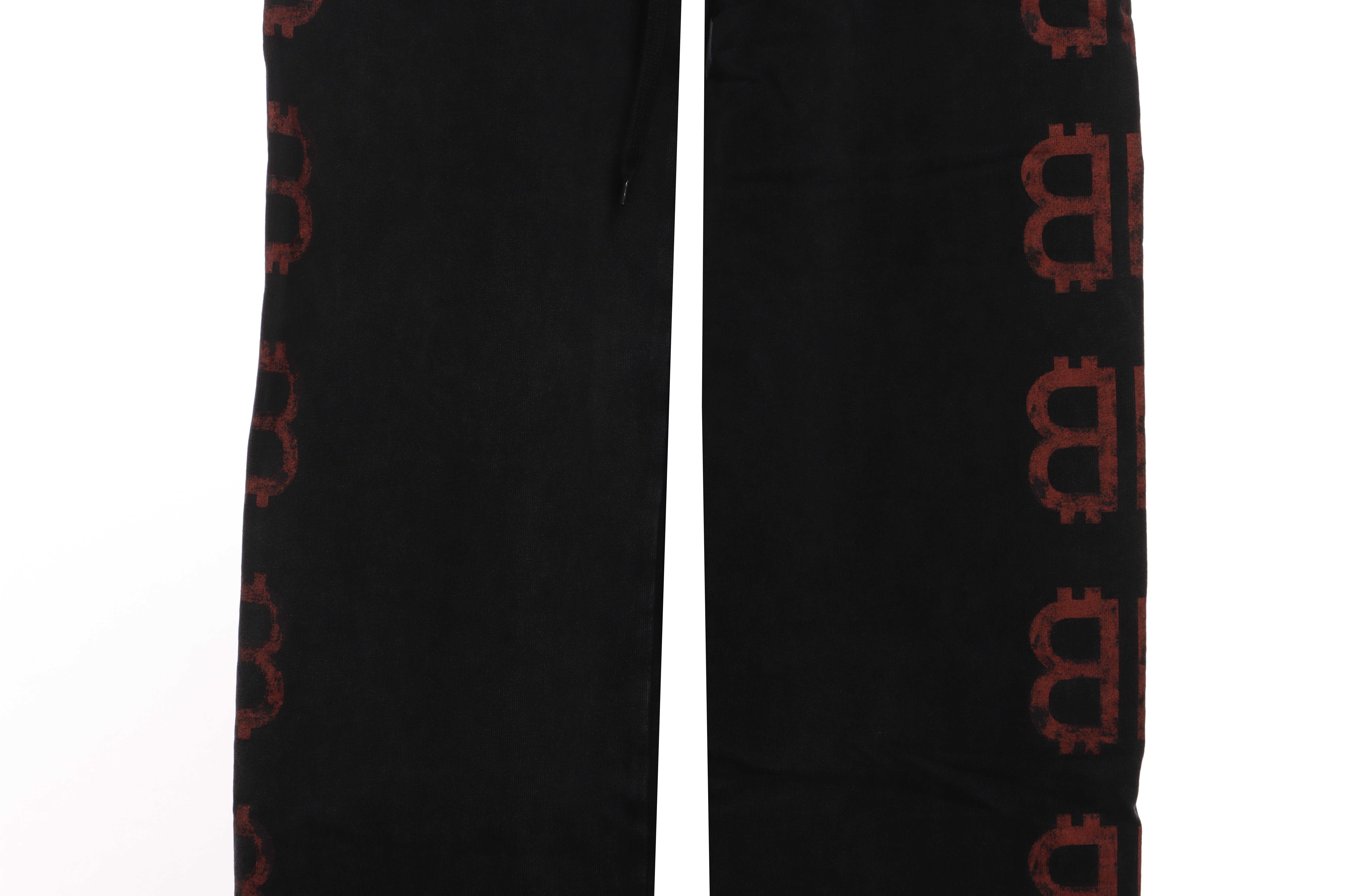 Balenciaga Double B Distressed Mud-Dyed Trousers