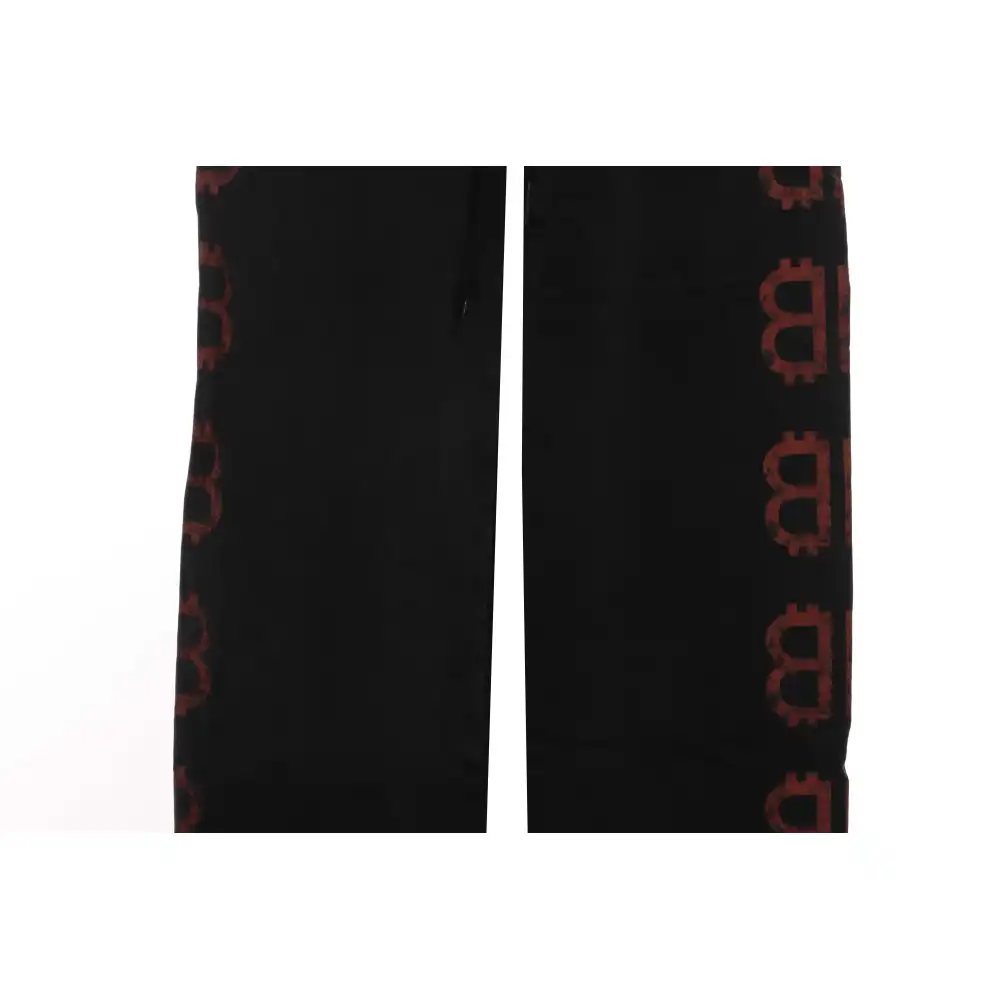 Balenciaga Double B Distressed Mud-Dyed Trousers